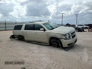 2015 Chevrolet Suburban LT with VIN 1GNSCJKC0FR153454, listed as a Copart auction lot 62672615 with 184,498 mi miles and Salvage title. Bid and sale history available at DreamBid. Image 13.