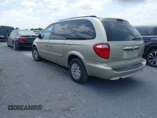2007 Chrysler Town & Country LX with VIN 2A4GP44R77R191548, listed as a IAAI auction lot 41108692 with 170,981 mi miles and . Bid and sale history available at DreamBid. Image 3.