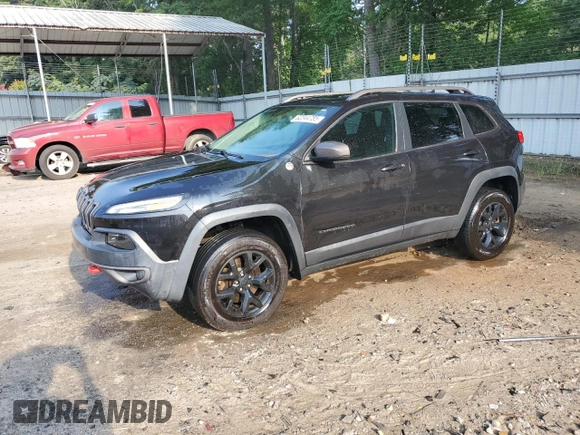 2015 Jeep Cherokee Trailhawk z VIN 1C4PJMBS6FW652001, wystawiony jako Copart lot #62344785 z przebiegiem 165 473 mil mil oraz Szkoda całkowita • Salvage title. Historia ofert i sprzedaży dostępna na DreamBid. Obrazek 1.