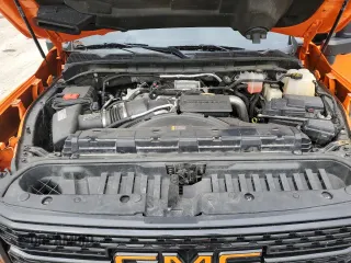 2021 GMC Sierra 3500HD Denali z VIN 1GT49WEY3MF113372, wystawiony jako Copart lot #74920824 z przebiegiem 26 900 mil mil oraz Szkoda całkowita • Salvage title. Historia ofert i sprzedaży dostępna na DreamBid. Obrazek 11.