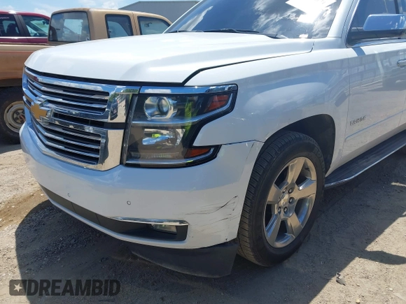 2020 Chevrolet Tahoe LTZ with VIN 1GNSCCKCXLR215899, listed as a IAAI auction lot 40128171 with 109,541 mi miles and . Bid and sale history available at DreamBid. Image 6.
