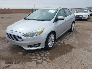 2017 Ford Focus Titanium with VIN 1FADP3J24HL229702, listed as a IAAI auction lot 42057013 with 120,250 mi miles and . Bid and sale history available at DreamBid. Image 2.