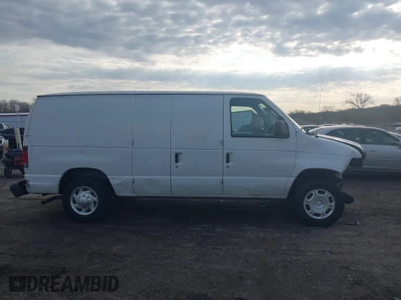 2013 Ford Econoline Cargo Commercial with VIN 1FTNE1EW4DDA09857, listed as a IAAI auction lot 41889302 with 131,059 mi miles and . Bid and sale history available at DreamBid. Image 13.