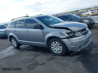 2016 Dodge Journey SE with VIN 3C4PDCAB0GT230512, listed as a IAAI auction lot 41434785 with 140,829 mi miles. Bid and sale history available at carsss.com. Image 13.