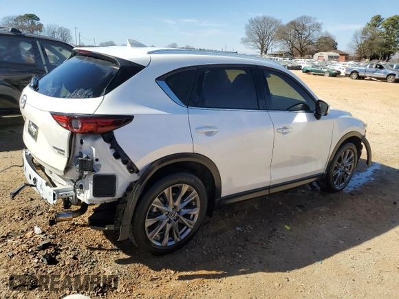 2021 Mazda CX-5 Signature with VIN JM3KFBEY5M0352778, listed as a Copart auction lot 47016035 with 37,961 mi miles and Salvage Title. Bid and sale history available at carsss.com. Image 3.