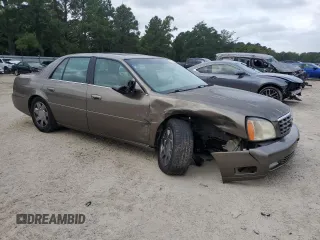 2000 Cadillac DeVille DTS z VIN 1G6KF5794YU249059, wystawiony jako Copart lot #71614494 z przebiegiem 121 611 mil mil oraz Szkoda całkowita • Salvage title. Historia ofert i sprzedaży dostępna na DreamBid. Obrazek 4.