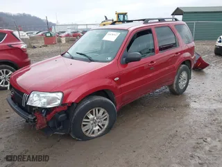 2005 Mercury Mariner Luxury with VIN 4M2YU57145DJ07713, listed as a IAAI auction lot 41678767 with 71,981 mi miles. Bid and sale history available at carsss.com. Image 2.