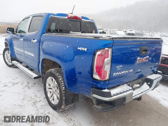 2018 GMC Canyon 4WD SLT with VIN 1GTG6DEN4J1135258, listed as a IAAI auction lot 41591180 with 66,820 mi miles. Bid and sale history available at carsss.com. Image 3.