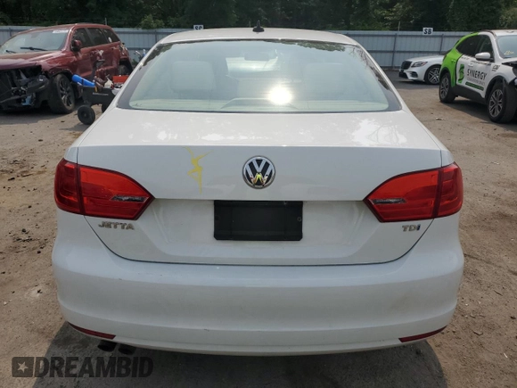 2014 Volkswagen Jetta TDI w/Premium z VIN 3VWLL7AJ6EM421646, wystawiony jako Copart lot #59305895 z przebiegiem Nie podano mil oraz Szkoda całkowita • Salvage title. Historia ofert i sprzedaży dostępna na DreamBid. Obrazek 6.