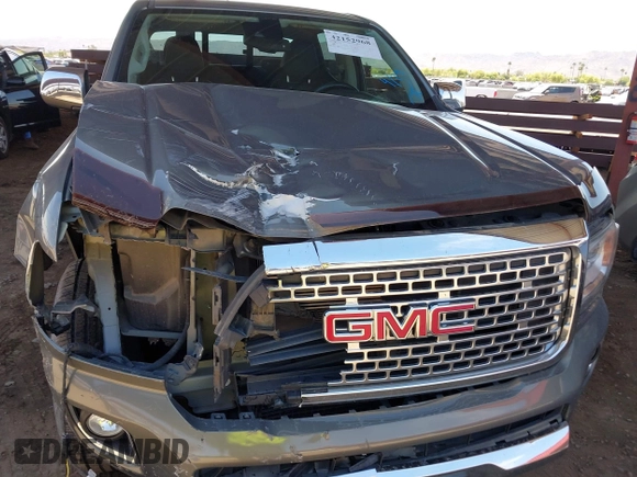2017 GMC Canyon 4WD Denali z VIN 1GTG6EENXH1315022, wystawiony jako IAAI lot #42152968 z przebiegiem 108 933 mil mil oraz . Historia ofert i sprzedaży dostępna na DreamBid. Obrazek 6.