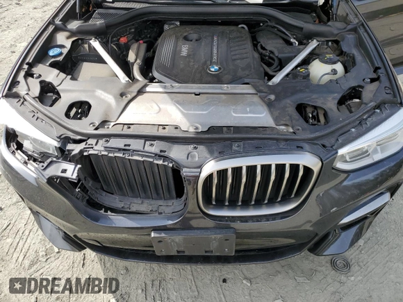2019 BMW X4 M40i with VIN 5UXUJ5C5XKLJ64004, listed as a Copart auction lot 52106895 with 74,599 mi miles and Salvage title. Bid and sale history available at DreamBid. Image 14.