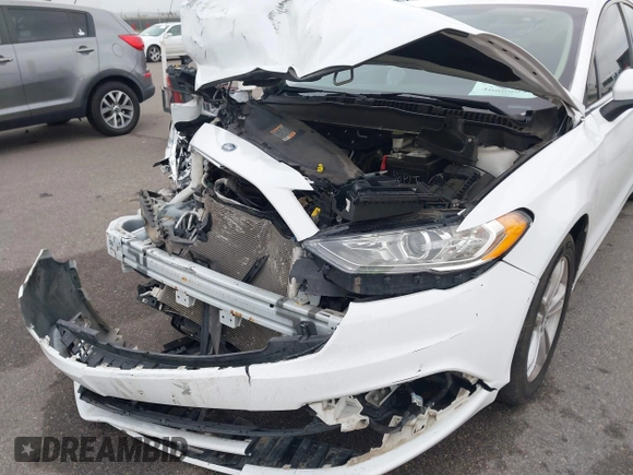 2018 Ford Fusion SE z VIN 3FA6P0H73JR212616, wystawiony jako IAAI lot #40869945 z przebiegiem 142 355 mil mil oraz . Historia ofert i sprzedaży dostępna na DreamBid. Obrazek 6.