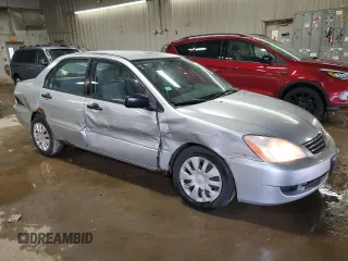 2006 Mitsubishi Lancer ES with VIN JA3AJ26E36U065974, listed as a Copart auction lot 52081885 with 201,728 mi miles and Salvage Title. Bid and sale history available at carsss.com. Image 4.