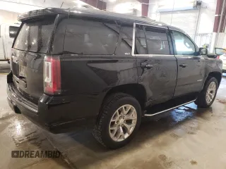 2019 GMC Yukon SLT with VIN 1GKS2BKC2KR238408, listed as a Copart auction lot 54893895 with 69,949 mi miles and Salvage Title. Bid and sale history available at DreamBid. Image 3.