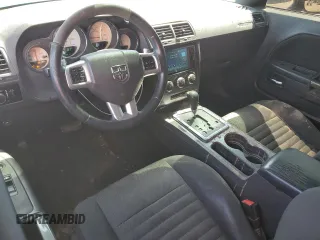 2013 Dodge Challenger SXT z VIN 2C3CDYAG0DH652215, wystawiony jako Copart lot #54781875 z przebiegiem 251 547 mil mil oraz Szkoda całkowita • Salvage title. Historia ofert i sprzedaży dostępna na DreamBid. Obrazek 8.