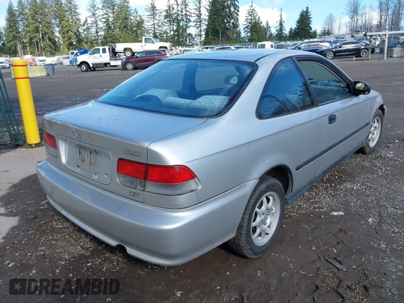 1999 Honda Civic HX with VIN 1HGEJ7122XL020224, listed as a IAAI auction lot 41723460 with 202,759 mi miles. Bid and sale history available at carsss.com. Image 4.