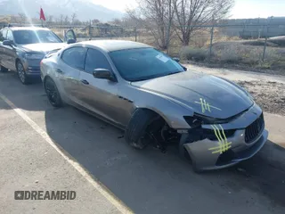 2015 Maserati Ghibli S Q4 z VIN ZAM57RTAXF1161982, wystawiony jako IAAI lot #41765607 z przebiegiem 83 875 mil mil oraz . Historia ofert i sprzedaży dostępna na DreamBid. Obrazek 1.