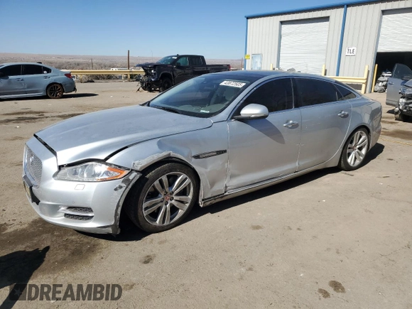 2014 Jaguar XJ Portfolio with VIN SAJWA2GZ2E8V70065, listed as a Copart auction lot 43872505 with 138,677 mi miles and Salvage title. Bid and sale history available at DreamBid. Image 1.