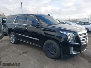 2018 Cadillac Escalade Platinum with VIN 1GYS4DKJ3JR200016, listed as a IAAI auction lot 41367220 with 105,043 mi miles. Bid and sale history available at carsss.com. Image 1.
