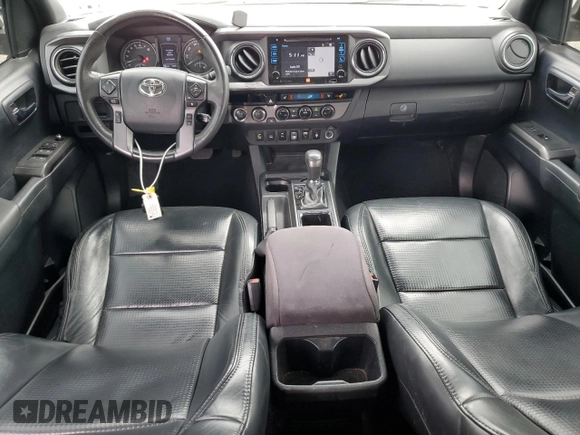 2018 Toyota Tacoma SR z VIN 3TMCZ5AN5JM181489, wystawiony jako Copart lot #55696365 z przebiegiem 70 091 mil mil oraz Szkoda całkowita • Salvage title. Historia ofert i sprzedaży dostępna na DreamBid. Obrazek 8.