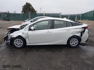 2019 Toyota Prius L Eco with VIN JTDKARFU8K3081187, listed as a IAAI auction lot 41771346 with 64,864 mi miles. Bid and sale history available at carsss.com. Image 14.