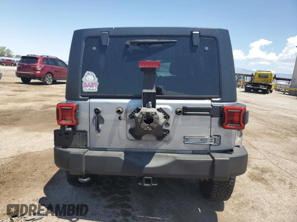 2014 Jeep Wrangler Unlimited Rubicon with VIN 1C4HJWFG1EL241014, listed as a Copart auction lot 63948655 with 165,650 mi miles and Salvage title. Bid and sale history available at DreamBid. Image 6.