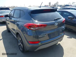 2017 Hyundai Tucson Value with VIN KM8J33A26HU385271, listed as a IAAI auction lot 42090148 with 95,170 mi miles. Bid and sale history available at carsss.com. Image 3.
