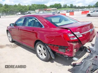2014 Ford Taurus SEL z VIN 1FAHP2E89EG126922, wystawiony jako IAAI lot #42236235 z przebiegiem 176 917 mil mil oraz . Historia ofert i sprzedaży dostępna na DreamBid. Obrazek 3.