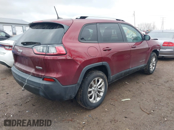 2020 Jeep Cherokee Latitude with VIN 1C4PJMCB3LD650308, listed as a IAAI auction lot 41052567 with 114,049 mi miles. Bid and sale history available at carsss.com. Image 4.