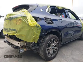 2018 BMW X2 sDrive28i z VIN WBXYJ3C31JEP76135, wystawiony jako IAAI lot #42136753 z przebiegiem 21 377 mil mil oraz . Historia ofert i sprzedaży dostępna na DreamBid. Obrazek 6.
