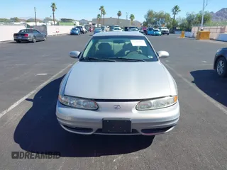 2000 Oldsmobile Alero GL2 z VIN 1G3NL52T6YC434404, wystawiony jako IAAI lot #42488982 z przebiegiem 110 828 mil mil oraz . Historia ofert i sprzedaży dostępna na DreamBid. Obrazek 6.