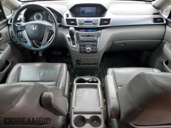 2012 Honda Odyssey Touring with VIN 5FNRL5H92CB047020, listed as a Copart auction lot 56539795 with 155,788 mi miles and Clean Title. Bid and sale history available at DreamBid. Image 8.