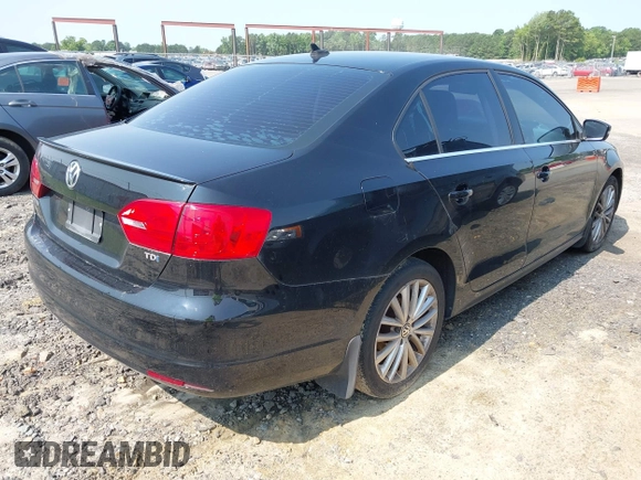 2013 Volkswagen Jetta TDI w/Premium/Nav with VIN 3VWLL7AJ1DM396749, listed as a IAAI auction lot 42403933 with 88,777 mi miles and . Bid and sale history available at DreamBid. Image 4.