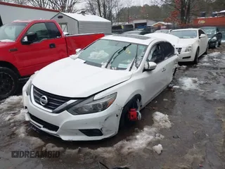 2016 Nissan Altima SL with VIN 1N4BL3APXGC154159, listed as a IAAI auction lot 41250840 with 158,728 mi miles and . Bid and sale history available at DreamBid. Image 16.