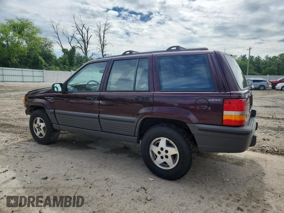 1994 Jeep Grand Cherokee Laredo z VIN 1J4GZ58S0RC221854, wystawiony jako Copart lot #61950825 z przebiegiem 69 465 mil mil oraz Czysty tytuł • Clean title. Historia ofert i sprzedaży dostępna na DreamBid. Obrazek 2.