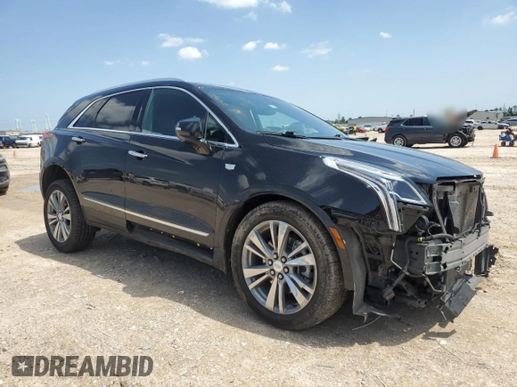 2022 Cadillac XT5 FWD Premium Luxury with VIN 1GYKNCRS0NZ178827, listed as a Copart auction lot 56200975 with 47,774 mi miles and Salvage title. Bid and sale history available at DreamBid. Image 4.