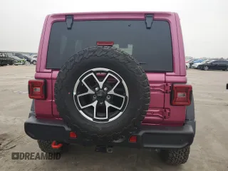 2024 Jeep Wrangler Rubicon with VIN 1C4PJXFG9RW346079, listed as a Copart auction lot 44136565 with 2,447 mi miles and Salvage Title. Bid and sale history available at DreamBid. Image 6.