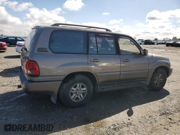 2000 Lexus LX 470 z VIN JT6HT00W9Y0120042, wystawiony jako Copart lot #49644355 z przebiegiem 188 992 mil mil oraz Czysty tytuł • Clean title. Historia ofert i sprzedaży dostępna na DreamBid. Obrazek 3.