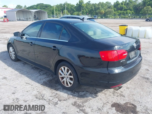 2014 Volkswagen Jetta SE with VIN 3VWD07AJ6EM413088, listed as a IAAI auction lot 42541755 with 163,278 mi miles and . Bid and sale history available at DreamBid. Image 3.