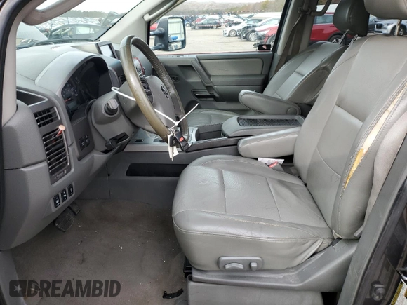 2007 Nissan Titan LE with VIN 1N6AA07B77N219993, listed as a Copart auction lot 44948415 with 170,422 mi miles and Salvage title. Bid and sale history available at DreamBid. Image 7.