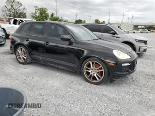 2009 Porsche Cayenne GTS with VIN WP1AD29P09LA61153, listed as a Copart auction lot 63034185 with 93,851 mi miles and Clean title. Bid and sale history available at DreamBid. Image 4.
