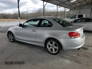 2013 BMW 1 Series 128i with VIN WBAUP7C51DVP24864, listed as a Copart auction lot 86905314 with 136,975 mi miles and Salvage Title. Bid and sale history available at carsss.com. Image 2.