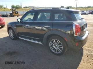 2020 MINI Countryman Oxford Edition with VIN WMZYW3C01L3L03306, listed as a Copart auction lot 64710354 with 63,101 mi miles and Salvage Title. Bid and sale history available at carsss.com. Image 2.