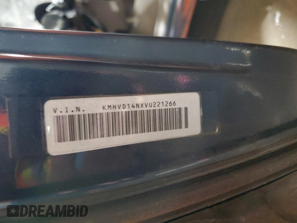 1997 Hyundai Accent z VIN KMHVD14NXVU221266, wystawiony jako Copart lot #86383044 z przebiegiem 159 517 mil mil oraz Szkoda całkowita • Salvage title. Historia ofert i sprzedaży dostępna na DreamBid. Obrazek 12.