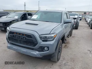 2021 Toyota Tacoma 4WD SR5 with VIN 3TMDZ5BN5MM116584, listed as a IAAI auction lot 41548175 with 23,031 mi miles. Bid and sale history available at carsss.com. Image 17.