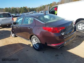 2013 Kia Optima LX with VIN 5XXGM4A74DG257866, listed as a IAAI auction lot 40975293 with 190,173 mi miles. Bid and sale history available at carsss.com. Image 3.