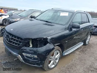 2012 Mercedes-Benz M-Class ML 350 with VIN 4JGDA5HB4CA001311, listed as a IAAI auction lot 41978079 with 143,328 mi miles. Bid and sale history available at carsss.com. Image 2.