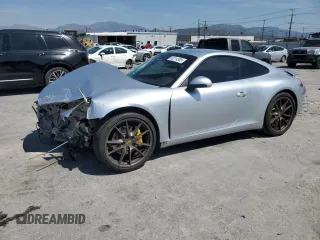 2015 Porsche 911 Carrera z VIN WP0AA2A92FS106232, wystawiony jako Copart lot #50214305 z przebiegiem 86 060 mil mil oraz Szkoda całkowita • Salvage title. Historia ofert i sprzedaży dostępna na DreamBid. Obrazek 1.