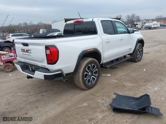 2024 GMC Canyon 4WD AT4 with VIN 1GTP6DEK1R1230068, listed as a IAAI auction lot 41491052 with 2,058 mi miles. Bid and sale history available at carsss.com. Image 4.