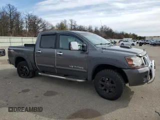 2007 Nissan Titan LE with VIN 1N6AA07B77N219993, listed as a Copart auction lot 44948415 with 170,422 mi miles and Salvage title. Bid and sale history available at DreamBid. Image 4.